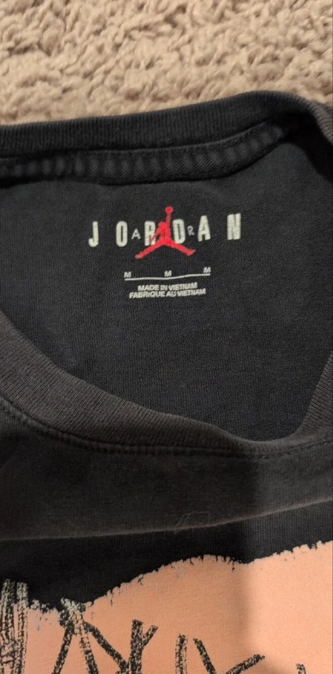 Jordan Black Tee with Coral-Pink Jumpman Logo